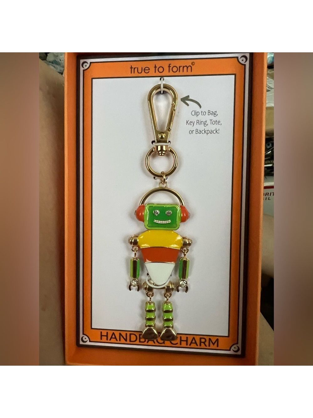 Handbag charm. Robot Candy Corn. The Robots arms & legs move. True To Form